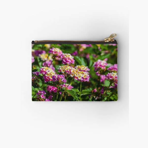 Item preview, Pink and Yellow Lantana Flowers Close-Up in Sunlit Garden With Clustered Blooms and Green Foliage designed and sold by Nmallia.