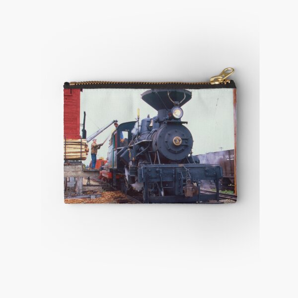 Item preview, A steam locomotive travels along a railway track surrounded by autumn foliage. Smoke billows from the engine as vibrant leaves create a colorful backdrop. Sumpter, Oregon,  Created on 35mm film. designed and sold by jklune.