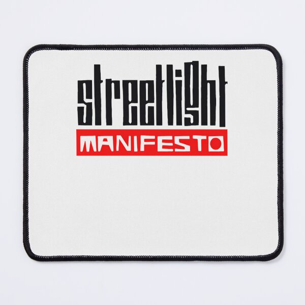 Item preview, Streetlight Above Red Block Reading Manifesto designed and sold by Dimpy Saini.