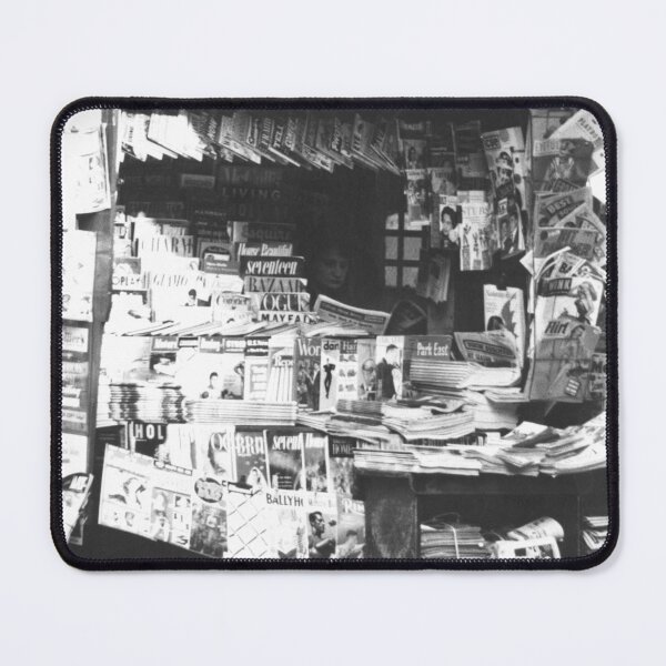 Item preview, Woman reading inside a New York City newsstand black and white street life photograph designed and sold by Astrid Arkhangelsky.