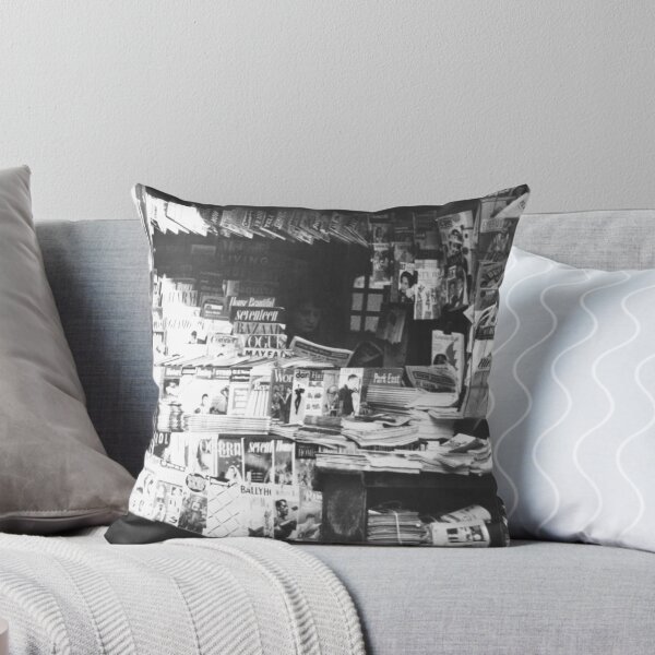 Item preview, Woman reading inside a New York City newsstand black and white street life photograph designed and sold by Astrid Arkhangelsky.