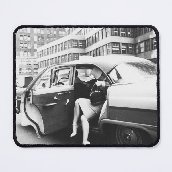 Item preview, Fashionable woman exiting a yellow cab taxi in New York City vintage black and white art print photograph designed and sold by Astrid Arkhangelsky.