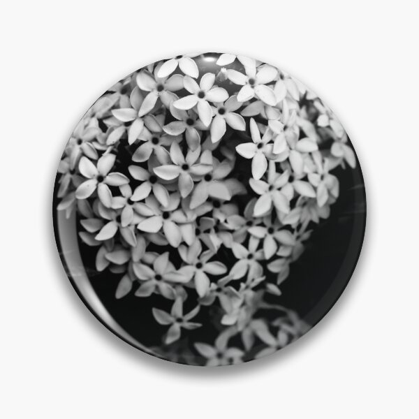 Item preview, black and white floral macro photograph featuring tiny flowers with a soft bokeh background. designed and sold by Dinasworld.