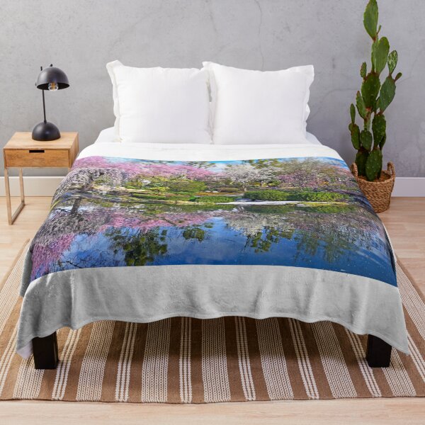 Item preview, Blossoming trees are reflected in the water, Setagaya Park in Vienna, springtime designed and sold by goceris.