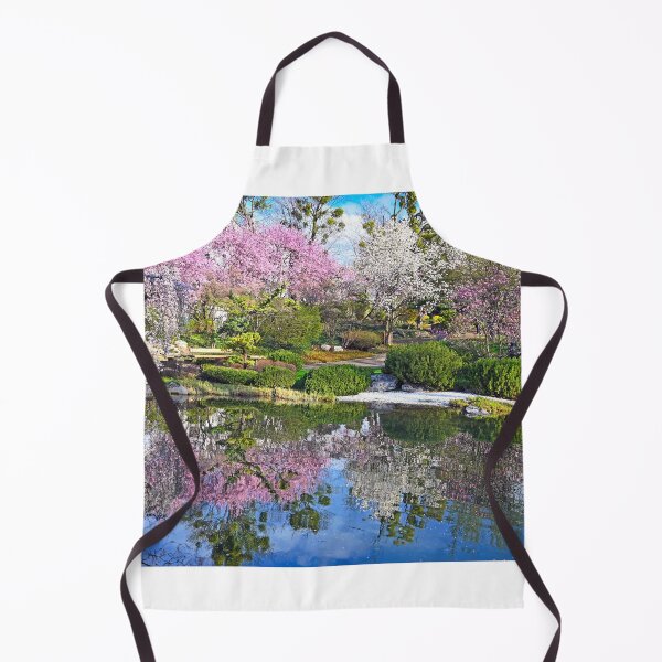 Item preview, Blossoming trees are reflected in the water, Setagaya Park in Vienna, springtime designed and sold by goceris.