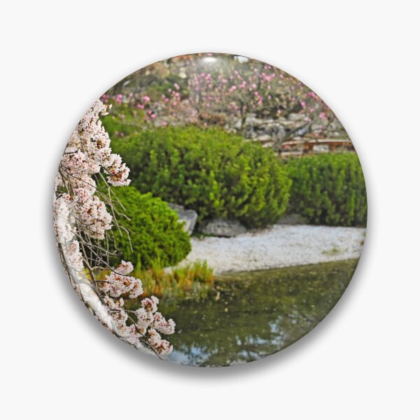 Item preview, Blossoming tree and pond in Setagaya Park in Vienna at springtime designed and sold by goceris.