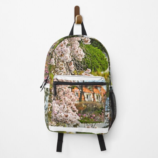Item preview, Blossoming tree and pond in Setagaya Park in Vienna at springtime designed and sold by goceris.