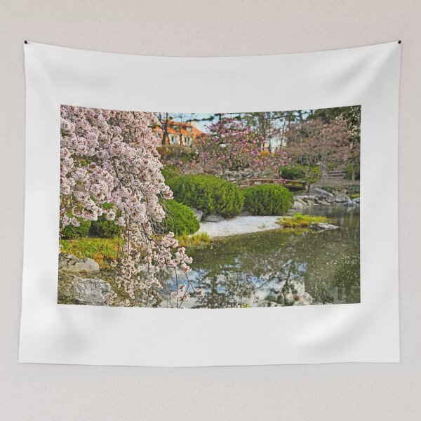 Item preview, Blossoming tree and pond in Setagaya Park in Vienna at springtime designed and sold by goceris.