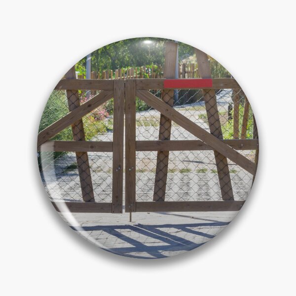 Item preview, Rustic Wooden Gate And Garden Fence Opening Onto Sunlit Path With Strong Shadow Patterns designed and sold by Nmallia.