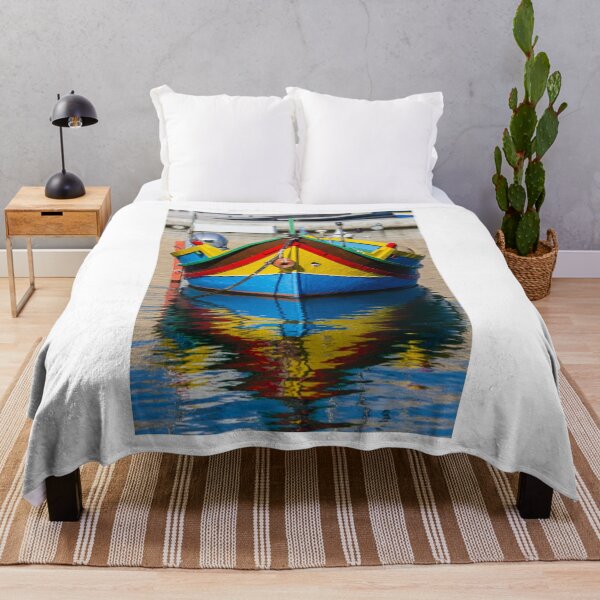 Item preview, Colorful Maltese Fishing Boat Luzzu Moored in Calm Harbor With Bright Reflections designed and sold by Nmallia.