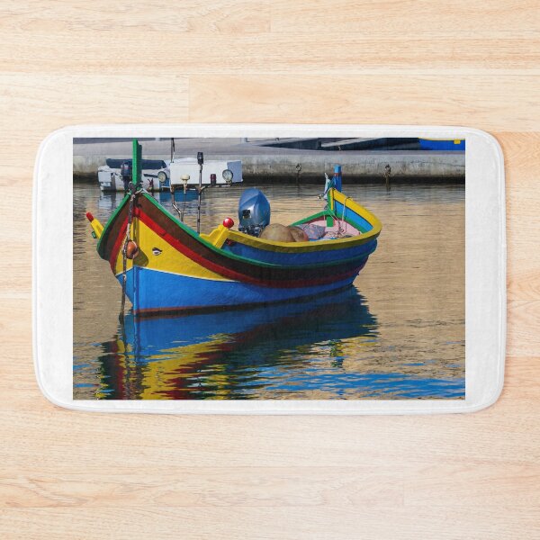 Item preview, Colorful Maltese Fishing Boat Luzzu Moored in Calm Harbor With Bright Reflections designed and sold by Nmallia.