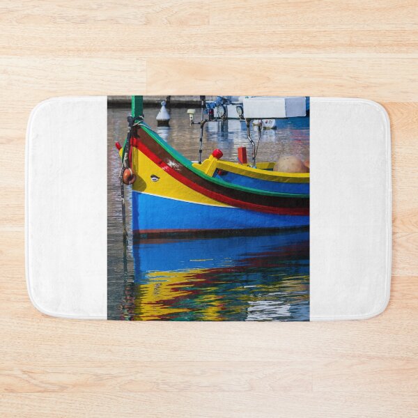 Item preview, Colorful Maltese Fishing Boat Luzzu Moored in Calm Harbor With Bright Reflections designed and sold by Nmallia.