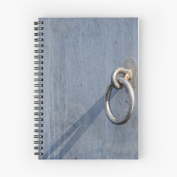 Item preview, Metal Ring Anchor Mounted On Weathered Gray Wall With Long Shadow, Industrial Hardware Detail designed and sold by Nmallia.