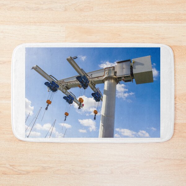 Item preview, Marine Travelift Crane Hoists Boats in Marina Overhead Lifting Equipment Against Blue Sky designed and sold by Nmallia.