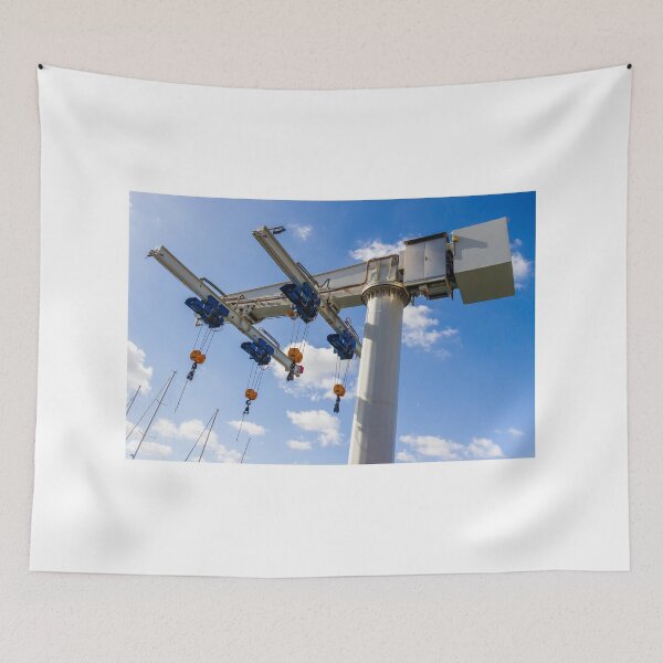 Item preview, Marine Travelift Crane Hoists Boats in Marina Overhead Lifting Equipment Against Blue Sky designed and sold by Nmallia.