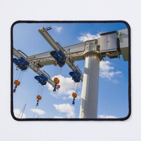 Item preview, Marine Travelift Crane Hoists Boats in Marina Overhead Lifting Equipment Against Blue Sky designed and sold by Nmallia.