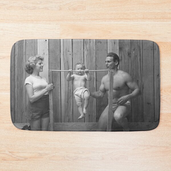 Item preview, Vintage bodybuilder Gene Jantzen with wife Pat and 11-month-old son Kent working out,1947 funny black and white photograph designed and sold by Astrid Arkhangelsky.