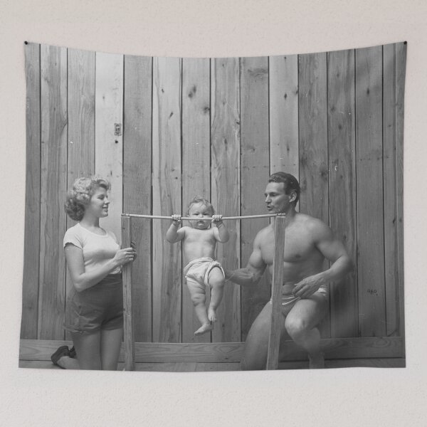Item preview, Vintage bodybuilder Gene Jantzen with wife Pat and 11-month-old son Kent working out,1947 funny black and white photograph designed and sold by Astrid Arkhangelsky.