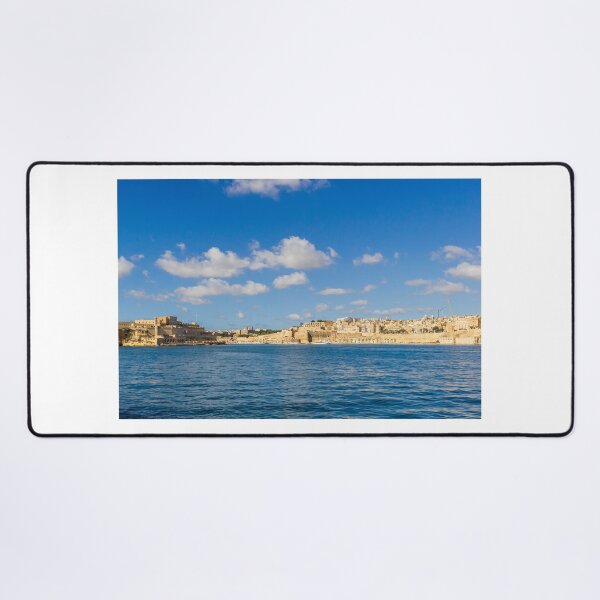 Item preview, Valletta Malta Waterfront Skyline Over Mediterranean Sea With Historic Limestone Buildings And Blue Sky designed and sold by Nmallia.