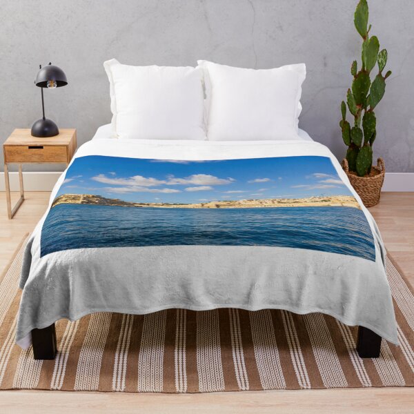 Item preview, Valletta Malta Waterfront Skyline Over Mediterranean Sea With Historic Limestone Buildings And Blue Sky designed and sold by Nmallia.