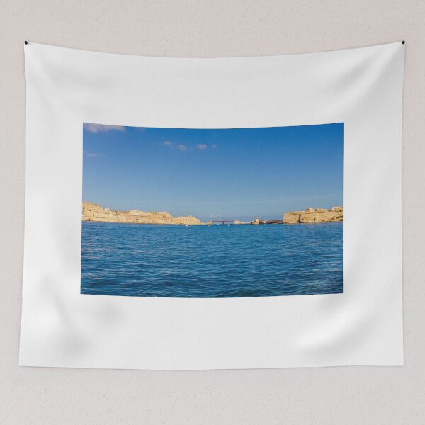 Item preview, Valletta Malta Waterfront Skyline Over Mediterranean Sea With Historic Limestone Buildings And Blue Sky designed and sold by Nmallia.