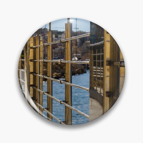 Item preview, Stainless Steel Railing Along Marina Waterfront Promenade With Blue Sea Reflections And Sunny Walkway designed and sold by Nmallia.