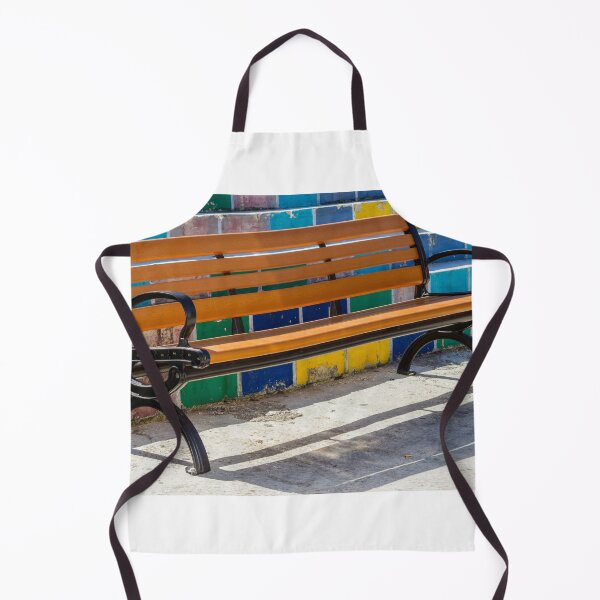 Item preview, Empty Wooden Bench Against Colorful Tiled Steps in Sunny Outdoor Urban Park designed and sold by Nmallia.