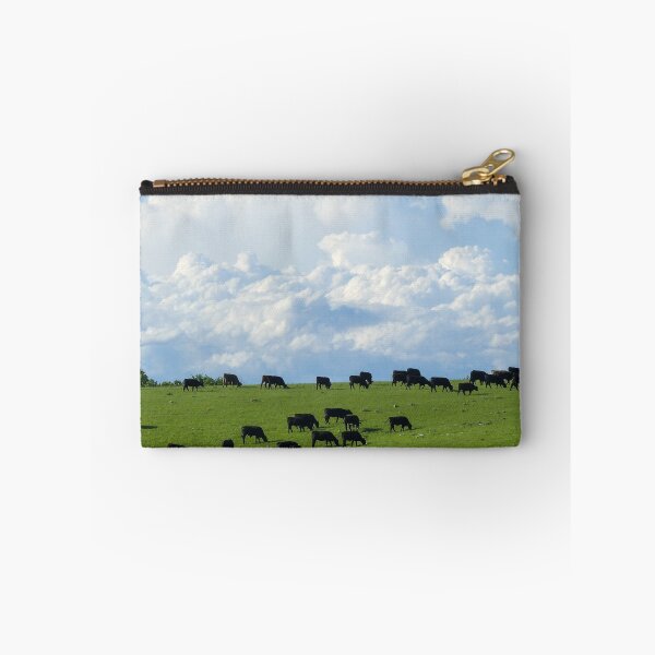 Item preview, Angus Cattle Graze on the Green Flint Hills with Storm Clouds Billowing against the backdrop of Blue Skies designed and sold by South 500 Photography.