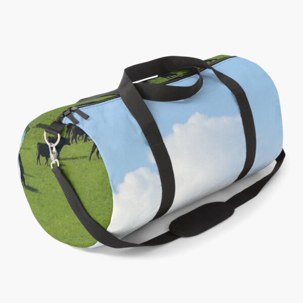 Item preview, Angus Cattle Graze on the Green Flint Hills with Storm Clouds Billowing against the backdrop of Blue Skies designed and sold by South 500 Photography.