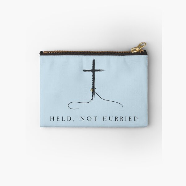 Artikelvorschau, Minimalistisches Kreuz-Shirt „Held Not Hurried“ für christliche Frauen entworfen und verkauft von POD DYNASTY | Original Print On Demand T-Shirt Graphics.