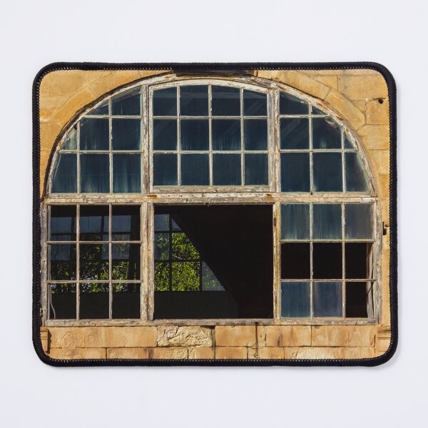 Item preview, Arched Old Window With Broken Panes in Weathered Stone Wall of Abandoned Building designed and sold by Nmallia.