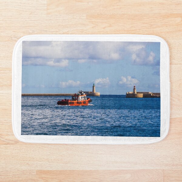 Item preview, Orange Pilot Boat Leaving Harbor With Lighthouse And Breakwater On Calm Blue Sea designed and sold by Nmallia.