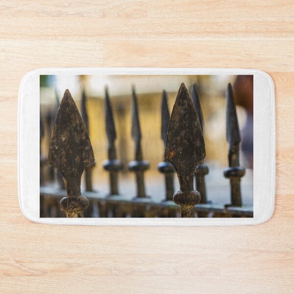 Item preview, Close-Up Of Wrought Iron Fence Spearheads With Rust And Cobwebs, Shallow Depth Of Field designed and sold by Nmallia.