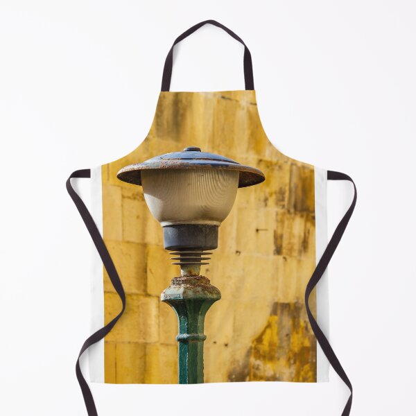 Item preview, Vintage Rusted Street Lamp Post Against Sunlit Yellow Stone Wall, Urban Texture and Decay designed and sold by Nmallia.