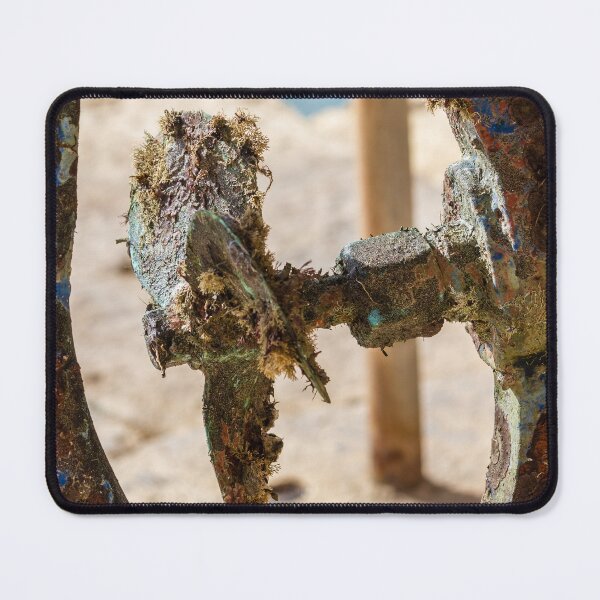 Item preview, Closeup Of Barnacle-Covered Marine Metal Showing Corrosion, Rust And Sea Growth On Beach designed and sold by Nmallia.