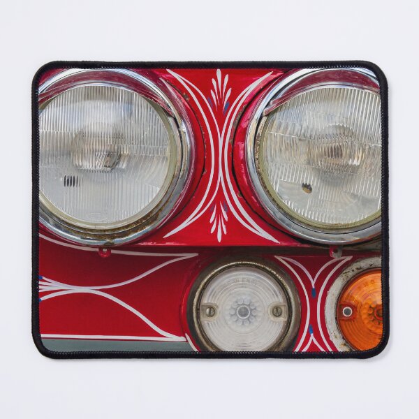 Item preview, Close-Up Of Vintage Red Car Headlights With Pinstripe Detail And Classic Turn Signal Lights designed and sold by Nmallia.