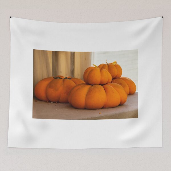 Item preview, Stacked Orange Pumpkins And Turban Squash Displayed Indoors For Autumn Harvest And Seasonal Decoration designed and sold by Nmallia.