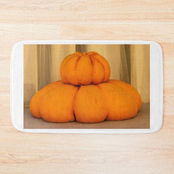 Item preview, Stacked Orange Pumpkins And Turban Squash Displayed Indoors For Autumn Harvest And Seasonal Decoration designed and sold by Nmallia.