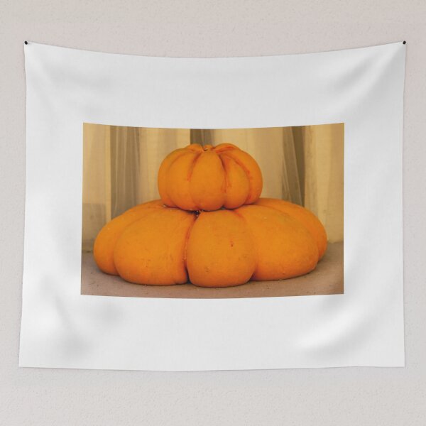 Item preview, Stacked Orange Pumpkins And Turban Squash Displayed Indoors For Autumn Harvest And Seasonal Decoration designed and sold by Nmallia.