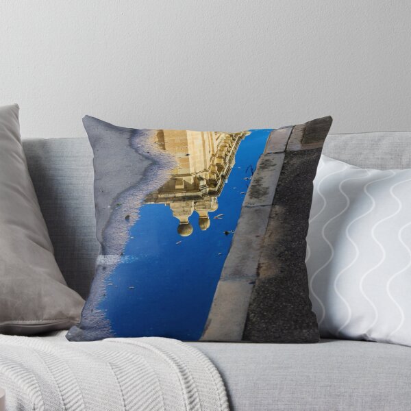 Item preview, Architectural Reflection in Puddle on Urban Street With Blue Sky and Historic Building Details designed and sold by Nmallia.