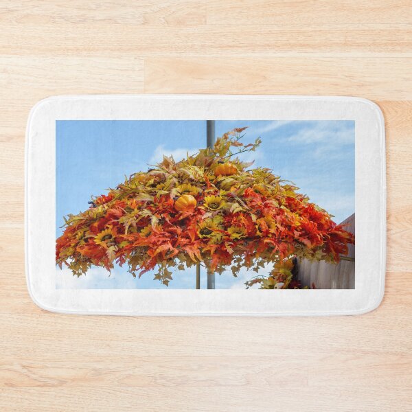 Item preview, Autumn Hanging Floral Decoration With Pumpkins And Sunflowers Against A Clear Blue Sky designed and sold by Nmallia.