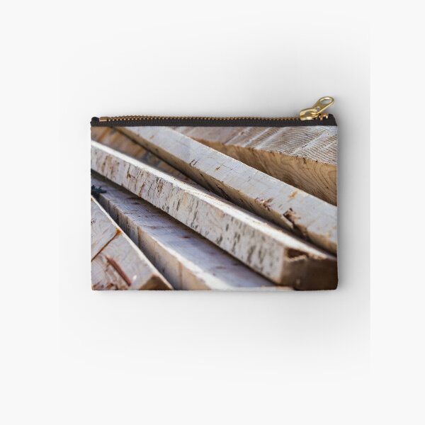 Item preview, Stacked Rough Lumber Planks And Timber Boards With Visible Grain For Construction And Carpentry designed and sold by Nmallia.