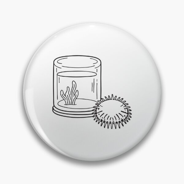 Item preview, A sea urchin shaped toy sitting near a fish tank designed and sold by rasagamastore.