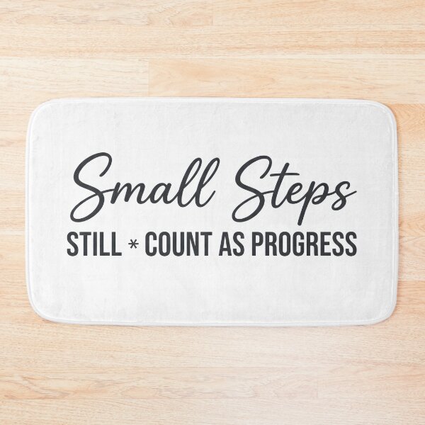 Item preview, Small Steps Still Count as Progress Motivational Quote Typography T-Shirt designed and sold by StickerNestYou.