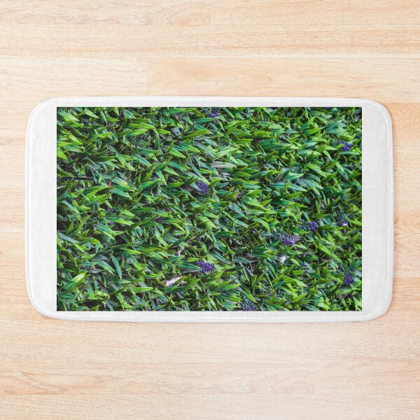 Item preview, Dense Green Groundcover Foliage With Small Purple Flowers And Textured Leaf Pattern designed and sold by Nmallia.