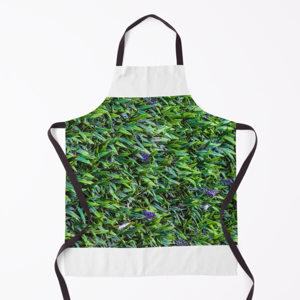 Item preview, Dense Green Groundcover Foliage With Small Purple Flowers And Textured Leaf Pattern designed and sold by Nmallia.