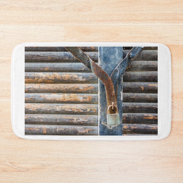 Item preview, Rusty Padlock Securing Weathered Wooden Shutters On Old Vintage Door With Peeling Paint designed and sold by Nmallia.