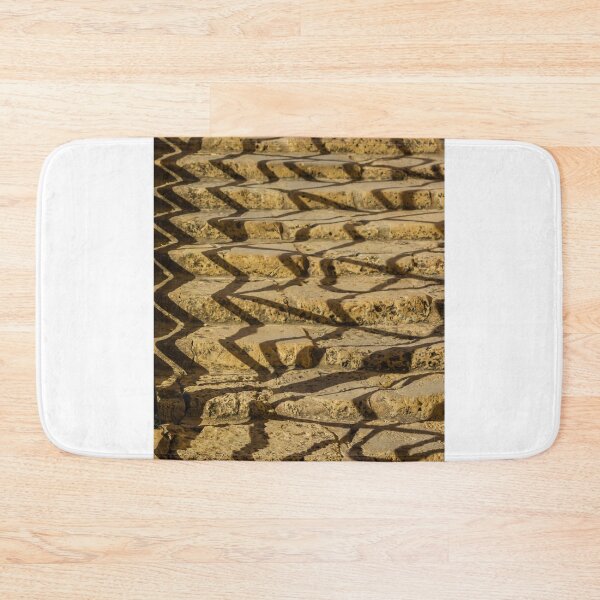 Item preview, Sunlit Weathered Stone Steps With Zigzag Shadows Creating Repetitive Texture And Architectural Pattern designed and sold by Nmallia.