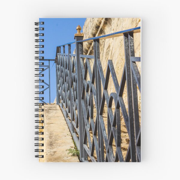 Item preview, Wrought Iron Railing on Stone Staircase With Geometric Pattern Against Blue Sky designed and sold by Nmallia.
