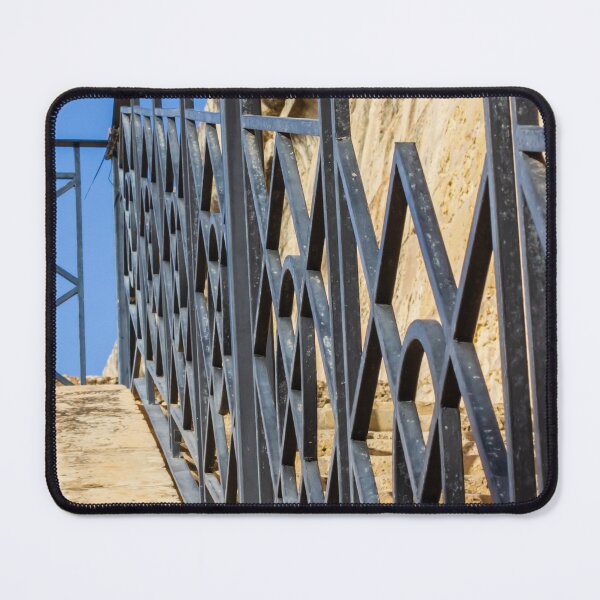 Item preview, Wrought Iron Railing on Stone Staircase With Geometric Pattern Against Blue Sky designed and sold by Nmallia.